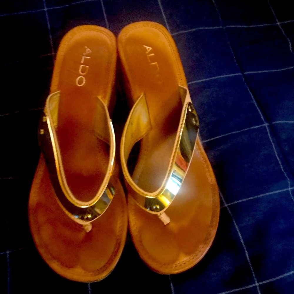 Aldo sandals with chrome-like straps and 3 inch cork heels